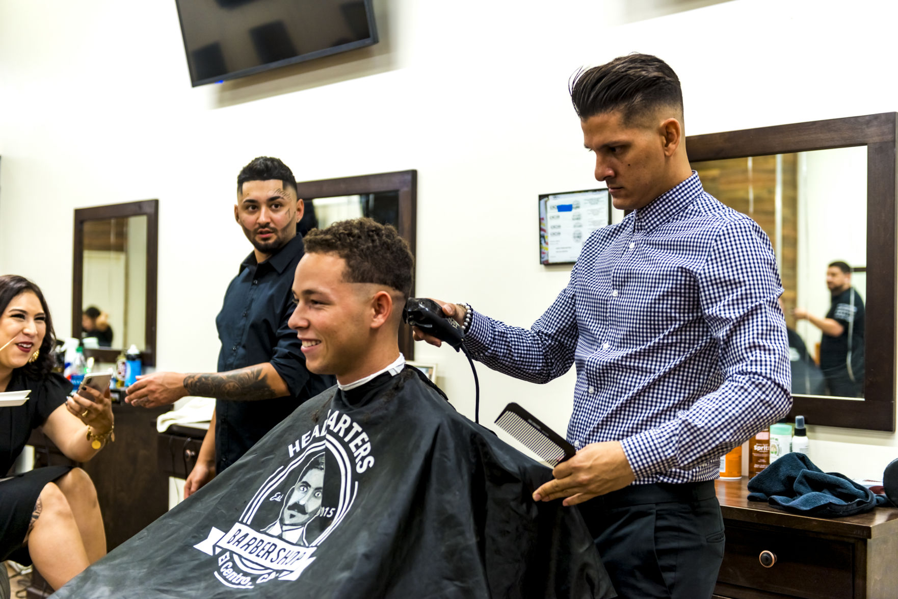 Headquarters Barbershop celebrated the grand opening of their new, larger location inside the Imperial Valley Mall